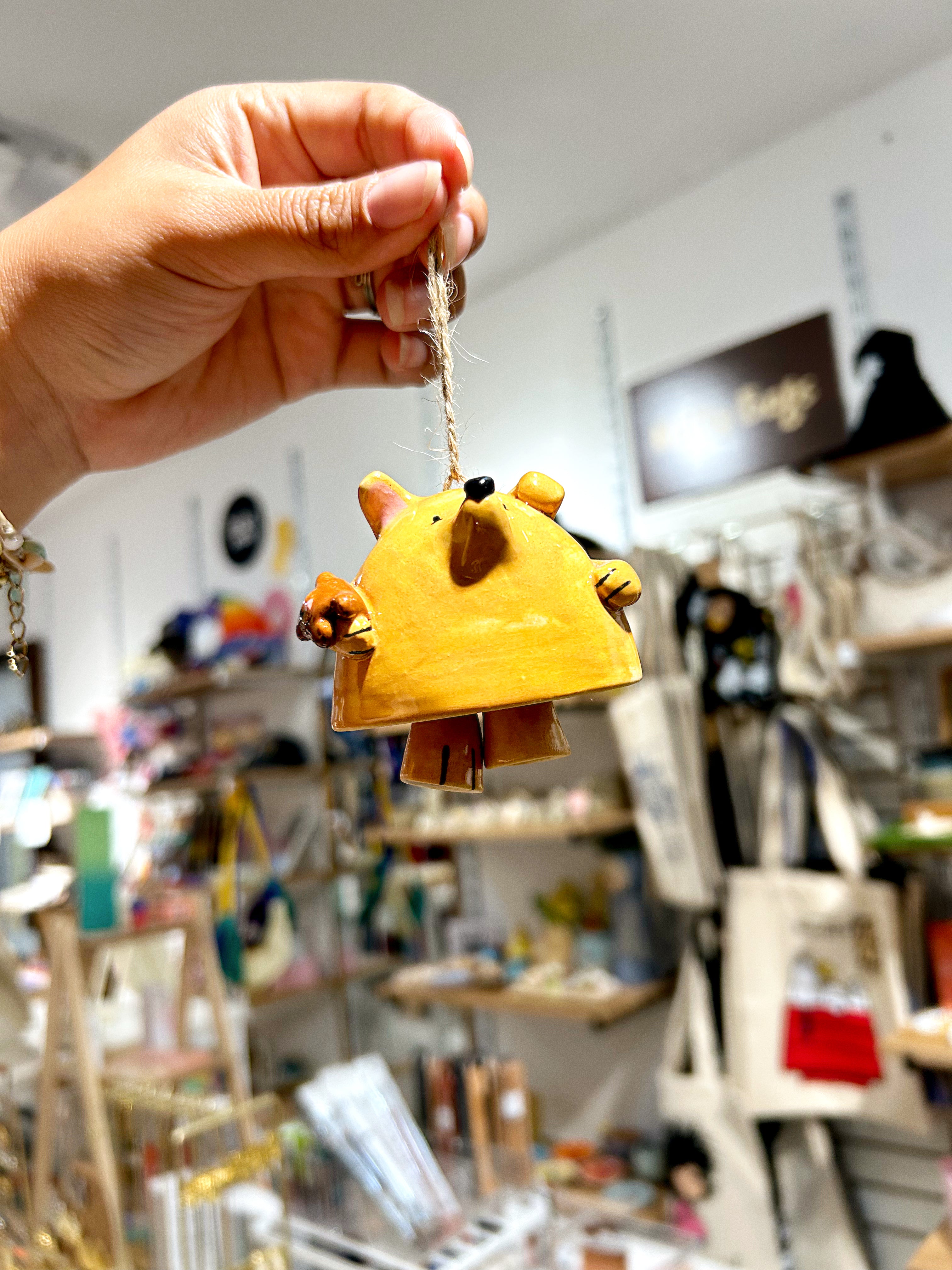 Campana perro caramelo
